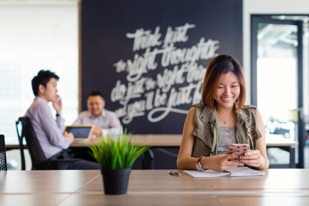 Image of Multiple people in different teams in a coworking environment